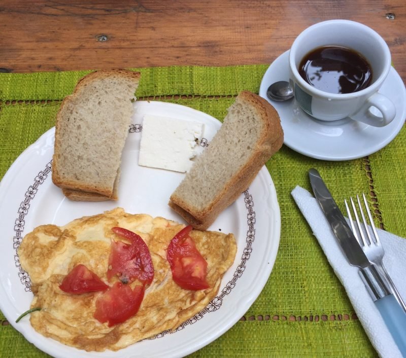 The best hostel I've ever stayed at for $12 a night, with this delicious omelette and Albanian coffee included. 