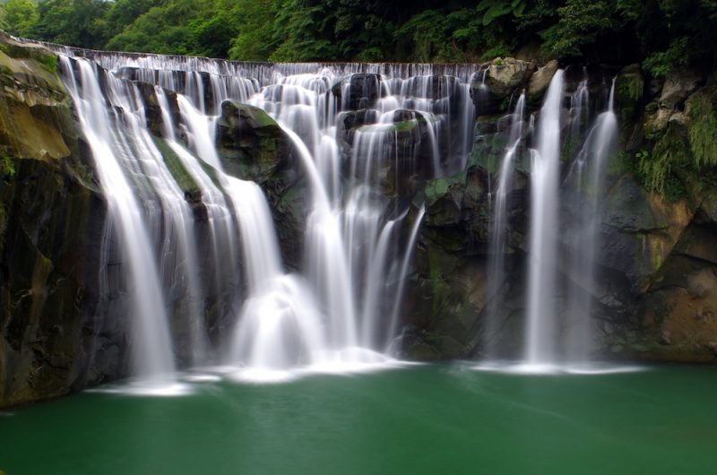 long exposure photograph of the shifen waterfall, a horseshoe waterfall in taiwan