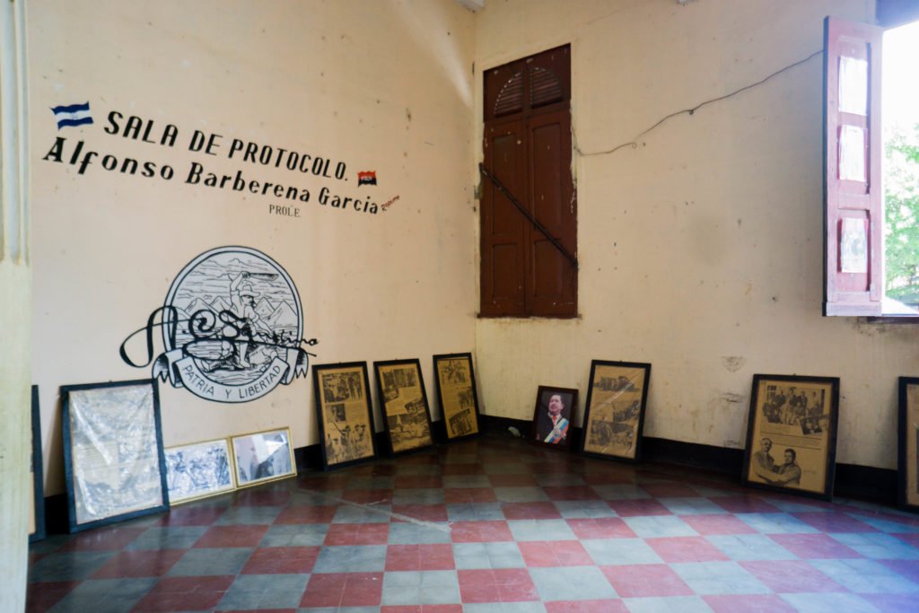 a small, humble museum room with some artifacts