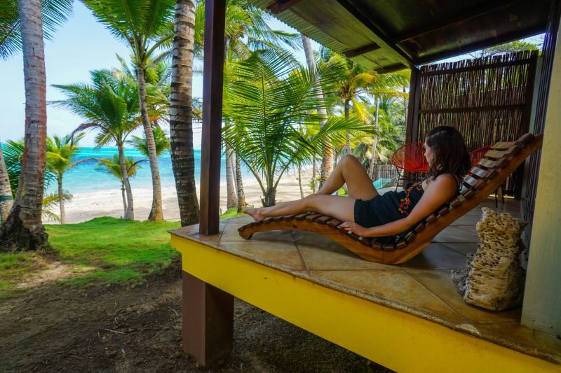 Allison Green lounging in a cabana in little corn island