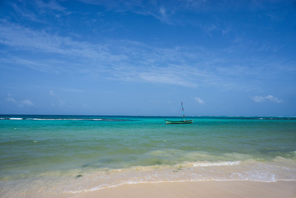 a sailboat on the sea in little corn island nicaragua