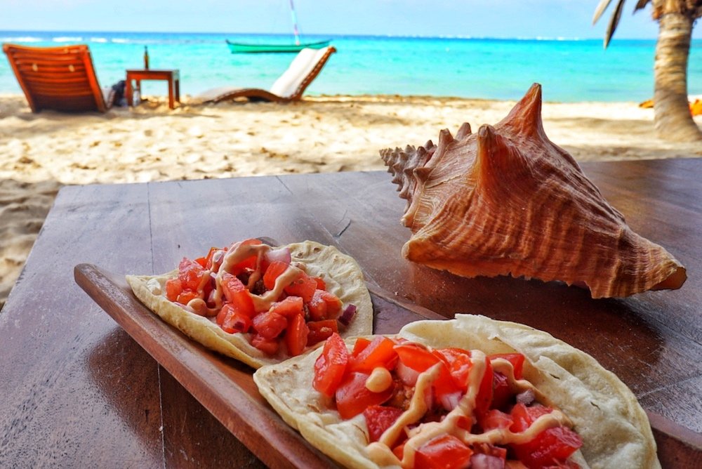 lobster tacos on the beach at little corn island