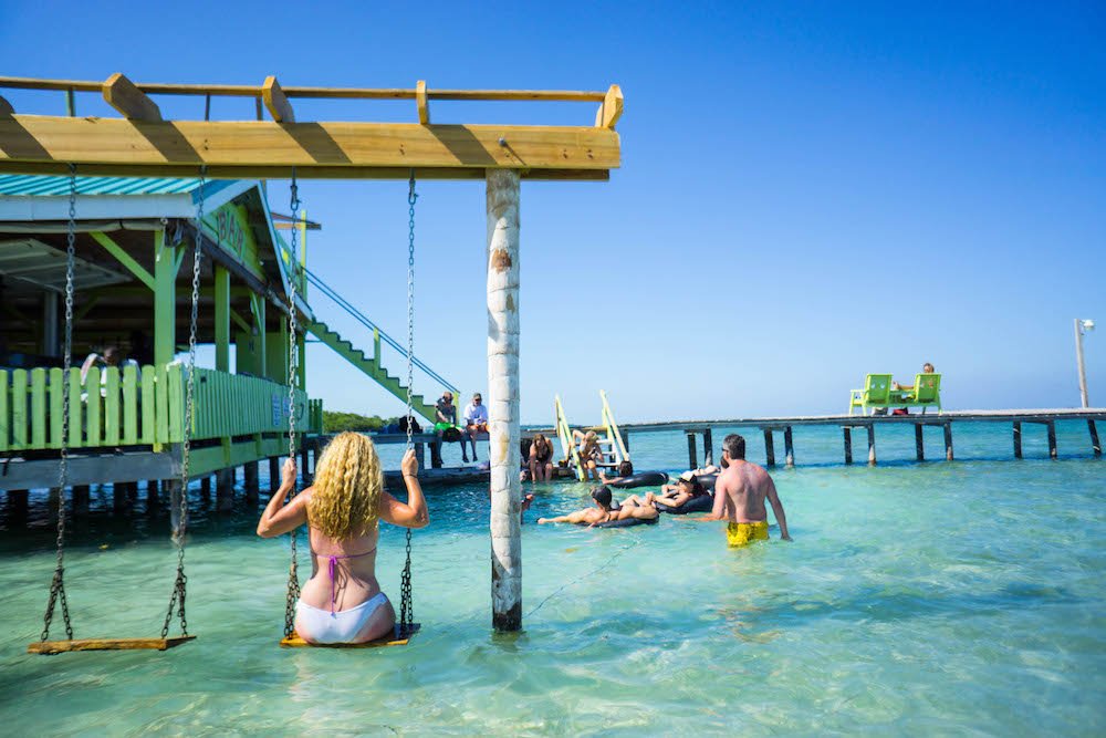 Allison's friend in Caye caulker at a beach bar