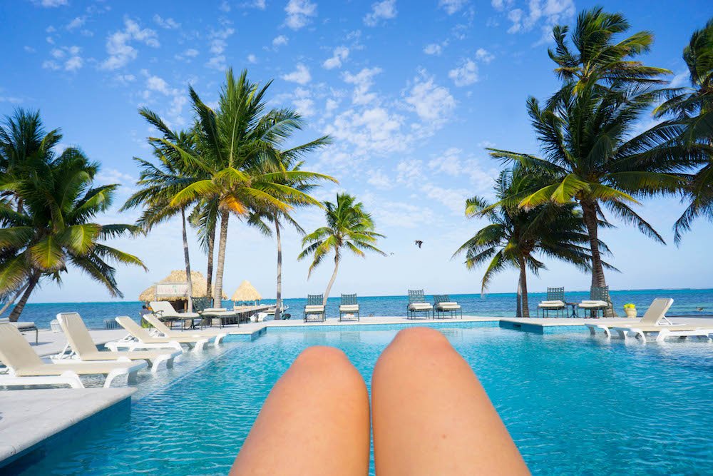 allison's legs in front of the pool view at victoria house