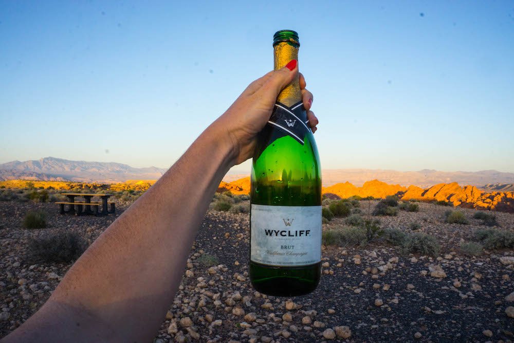 Sunset toast over the Valley of Fire with a bottle of champagne!