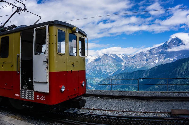 The old-fashioned cogwheel red and yellow train to schnyige platte in Switzerland's jungfrau region