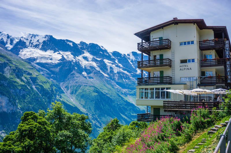 [hotel with snowy mountains in the background] one of the most scenic parts of Switzerland