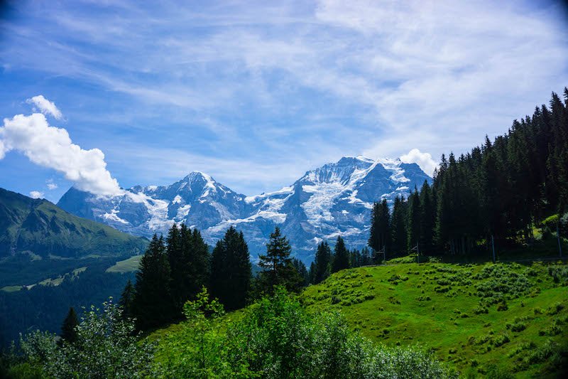 mountains in switzerland on a cloudy summer day