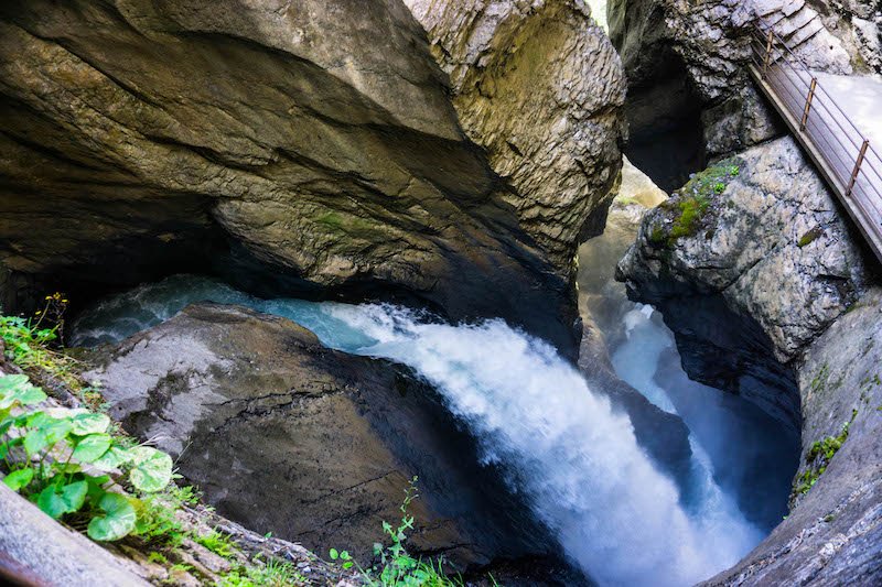 view of trummelbach falls with gorgeous water rushing down