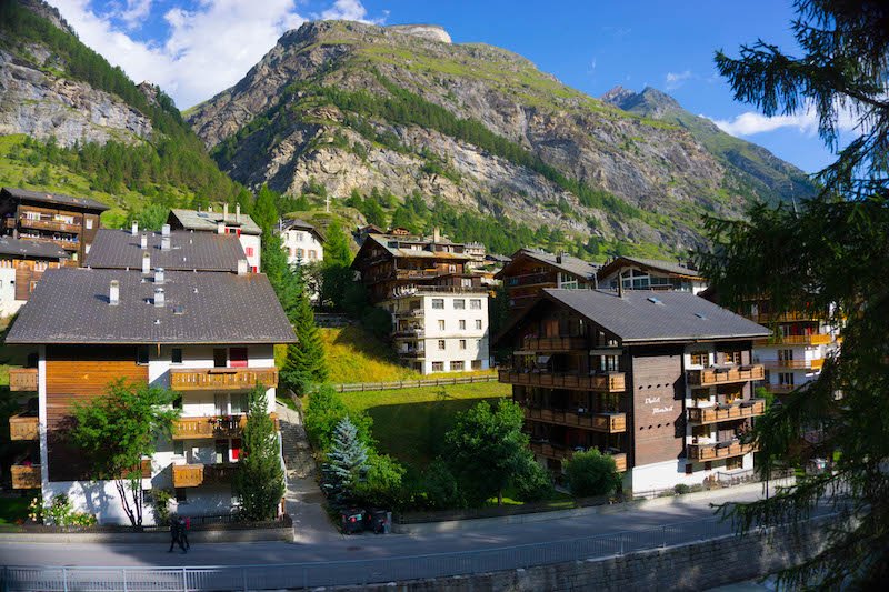 View of the town of Zermatt with traditional architecture of Switzerland and mountains