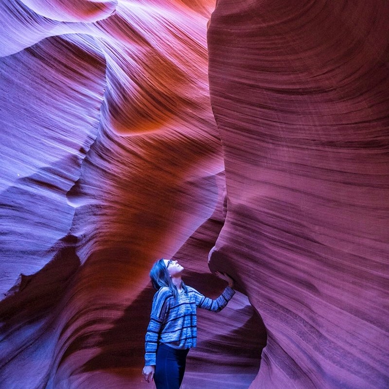 Allison in Antelope Canyon looking up at the slot canyon