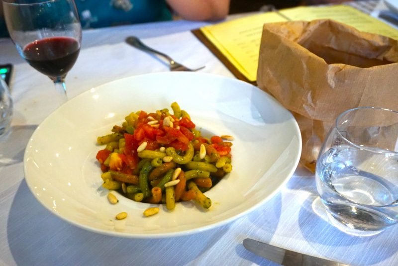 a plate of pesto pasta