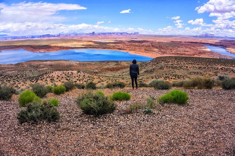 Allison standing in the Lake Powell landscape at Wahweap Overlook