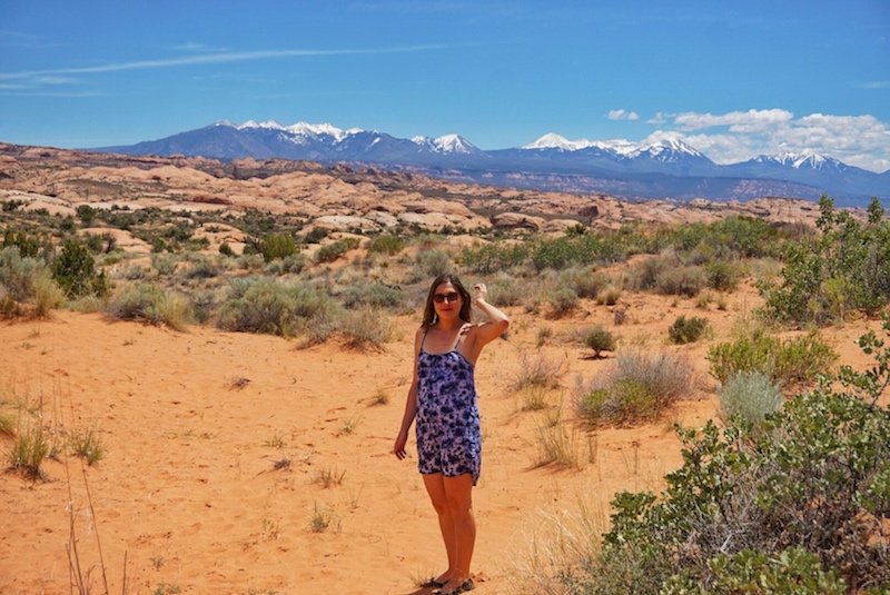 Allison exploring Arches National Park on a sunny day