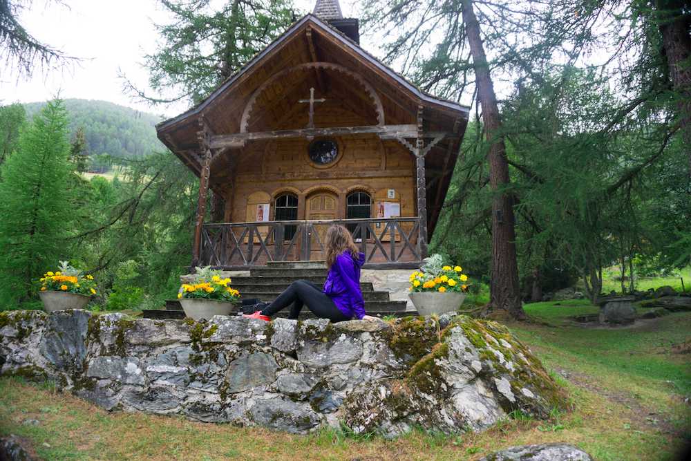 allison in front of a church in the nendaz region