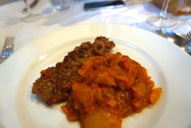 A classic food in Bologna, sausage and tomato jam