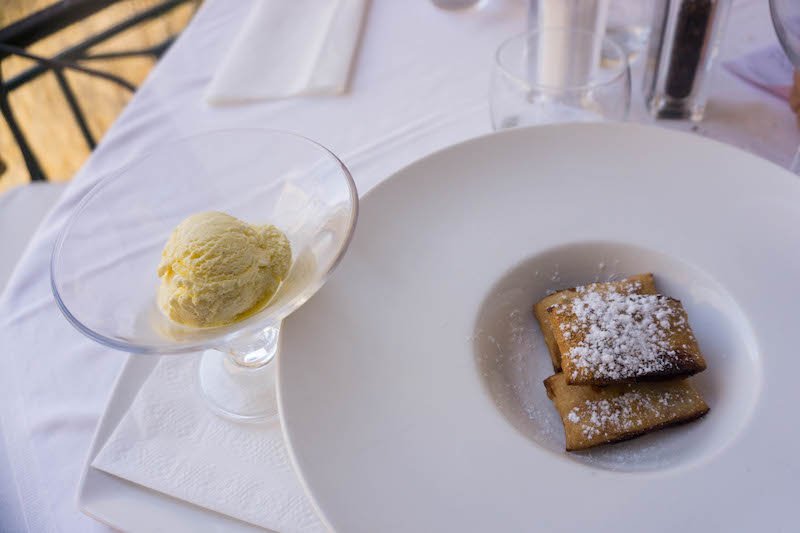 A dessert of fried pastry and ice cream in Malta