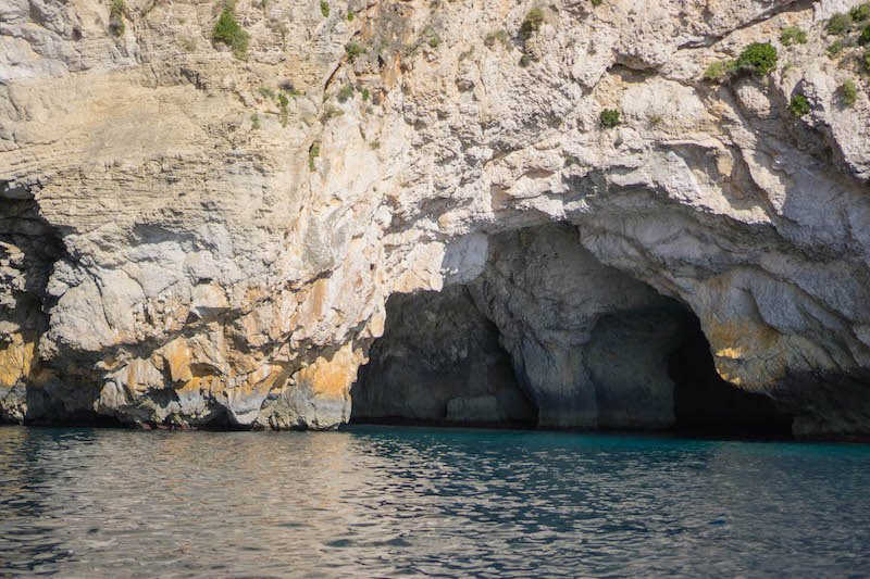 the blue waters of the caves at blue grotto