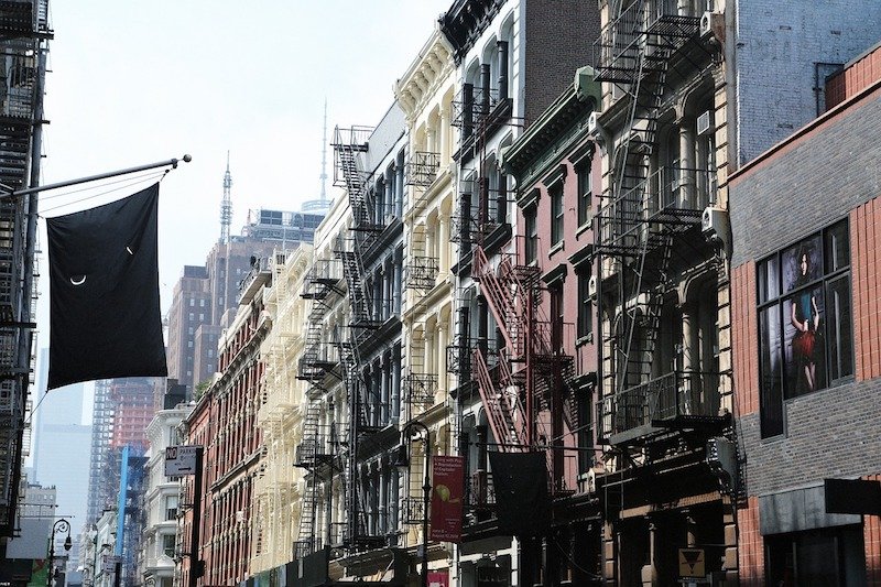 soho facades and fire escapes in new york city