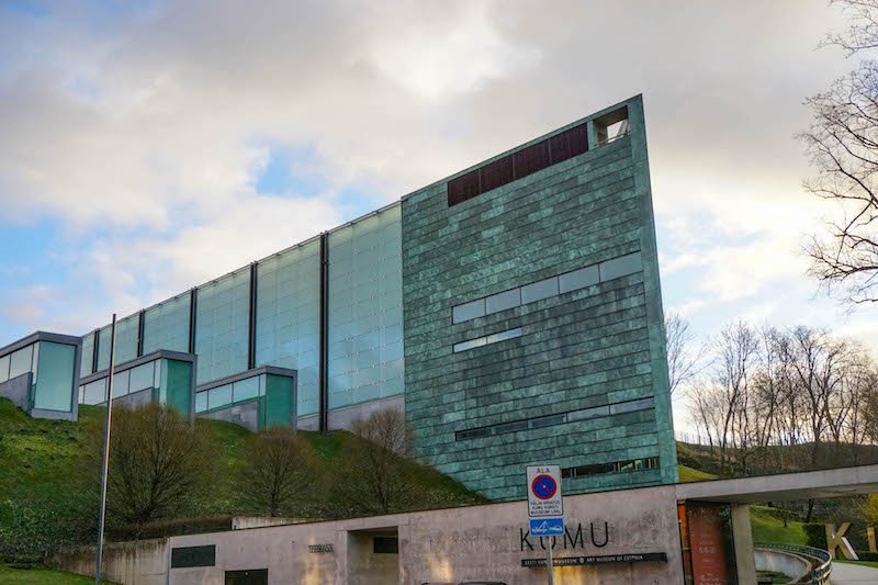 The exterior of the blue glass building of the Kumu art museum in Tallinn in winter