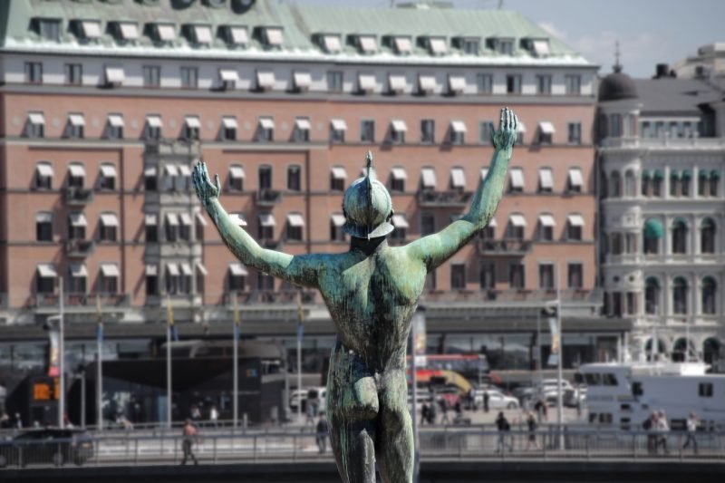 A statue in a harbor. Vasastan neighborhood has many Stockholm hostels.