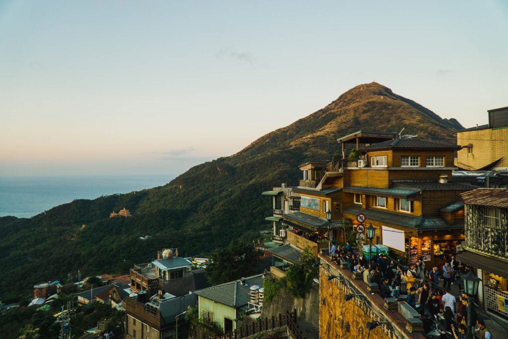 the old town of jiufen with mountain, tea shops built into the hillside