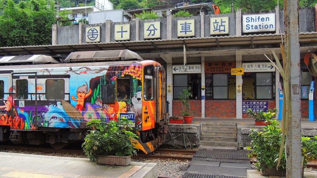 sign in front of train in taiwan