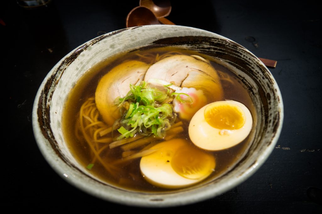 A bowl of ramen served at the famous ramen shop in Copenhagen called Ramen to birru, with egg and cha shiu.