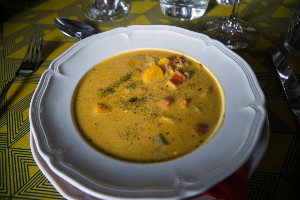 a bowl of fish soup