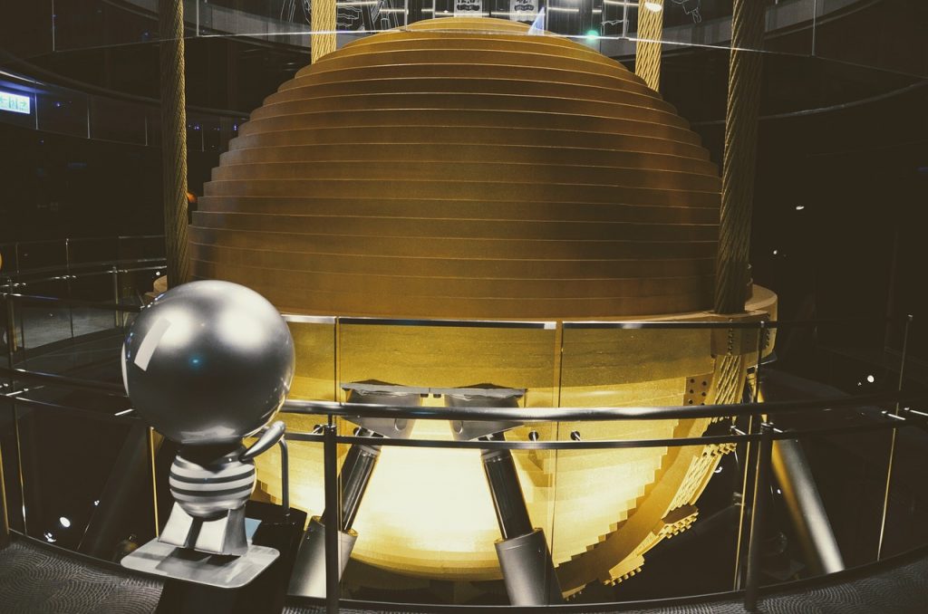 a golden ball at the center of the taipei 101 that helps balance the building in case of earthquakes