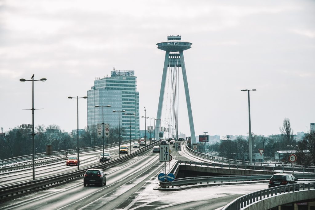 The UFO Bridge in Bratislava features a rotating disk at the top with windows and is otherwise a suspension bridge that covers the Danube River.