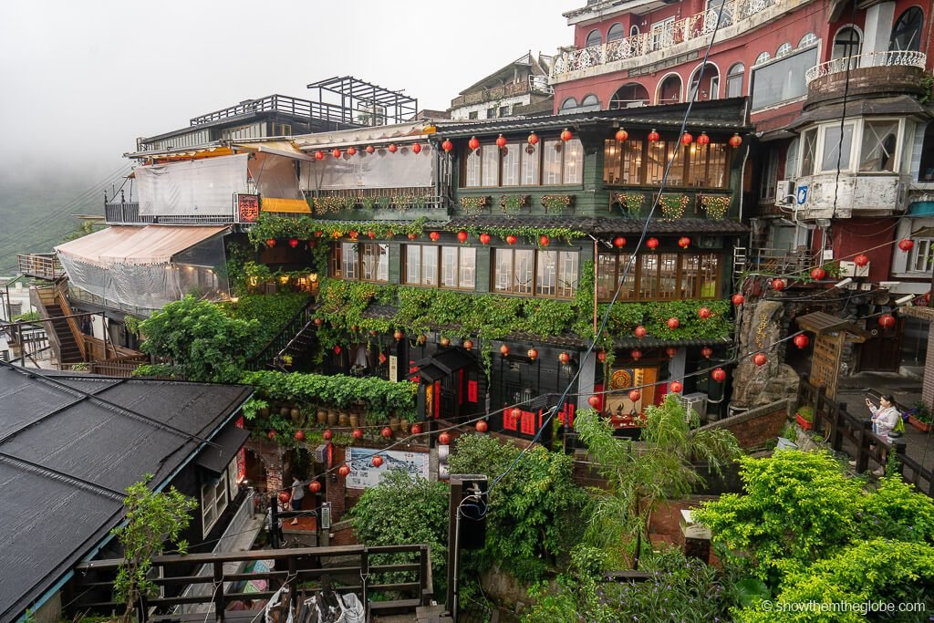 a view of jiufen teahouses in the day time