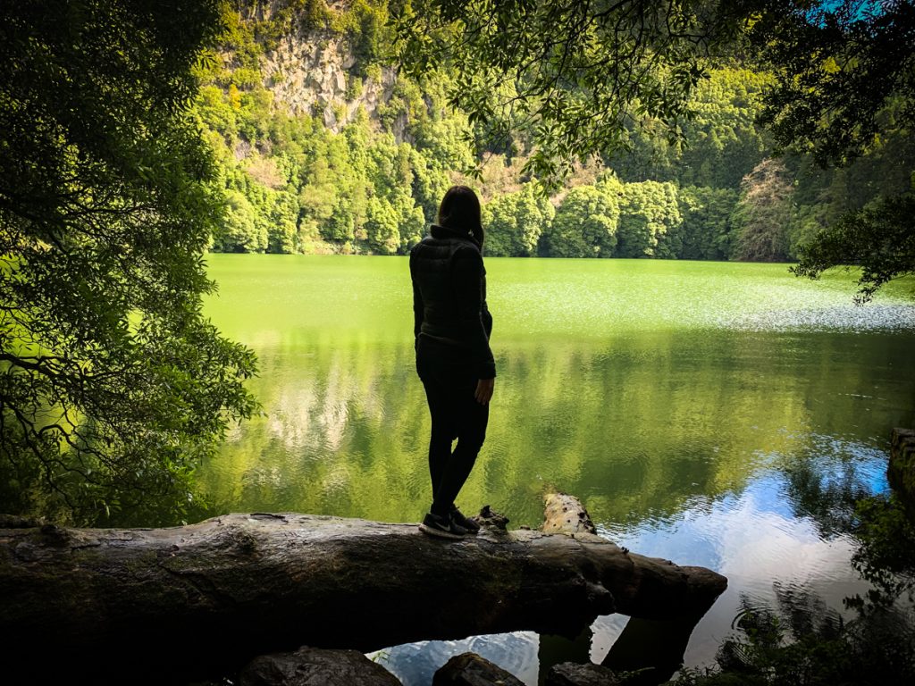 allison standing in front of a lake in the azores