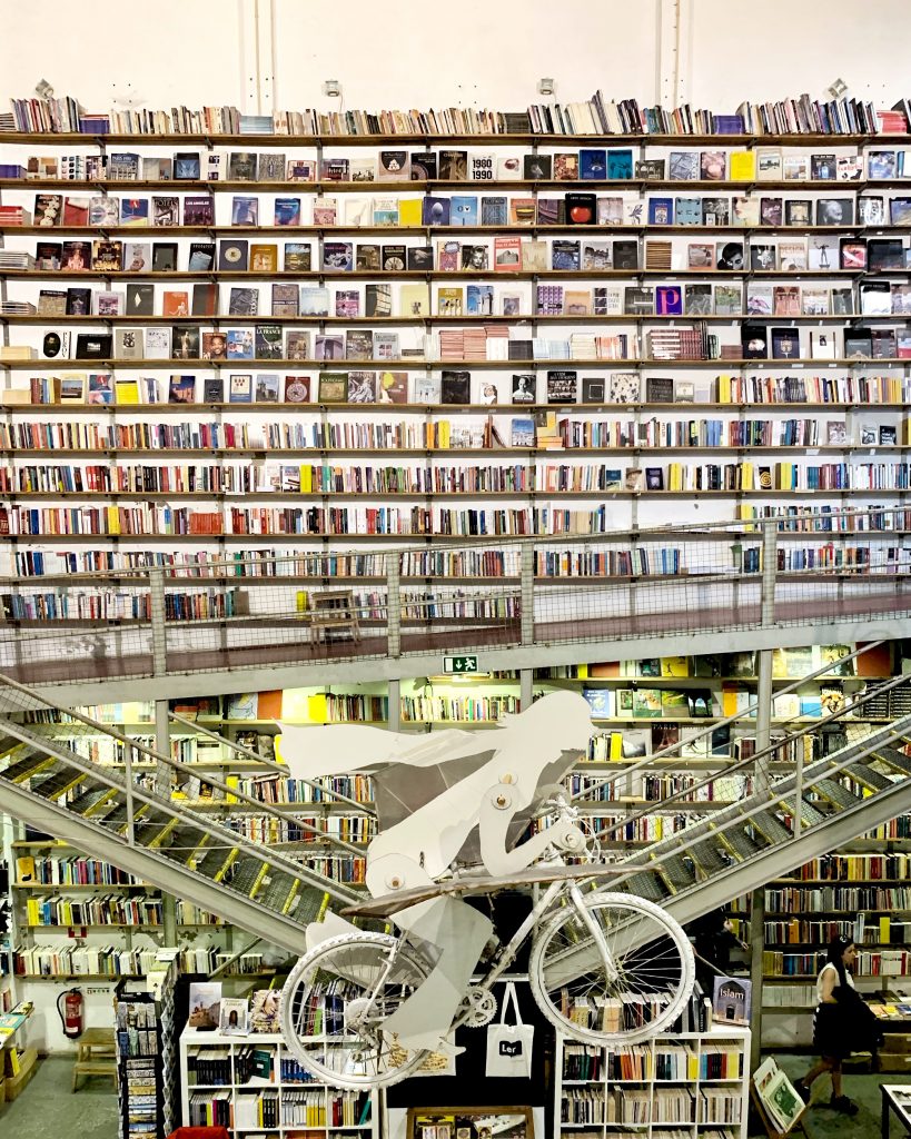 the interior of the ler devagar bookstore in lx factory in lisbon