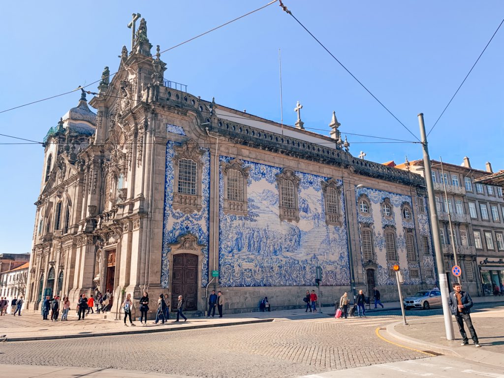 The lovely azulejos of Igreja Do Carmo, which is covered in blue and white tiles on a sunny day