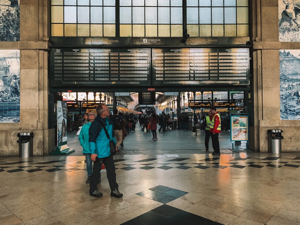 people walking in the train station in sao bento