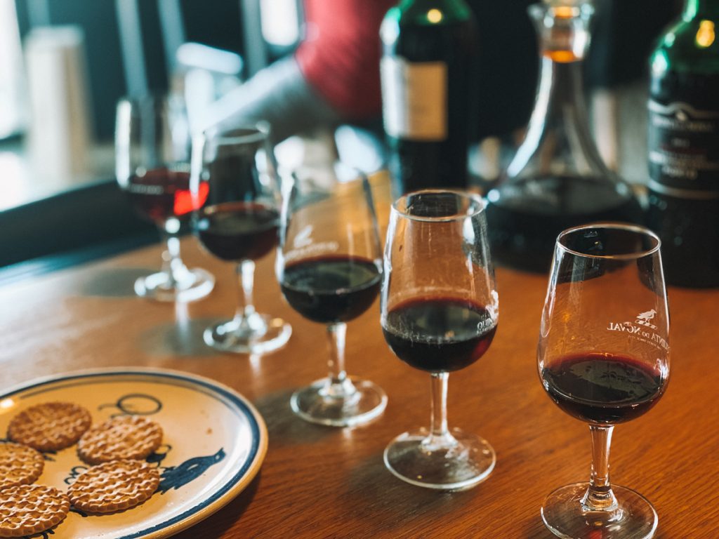 a row of four different glasses of port