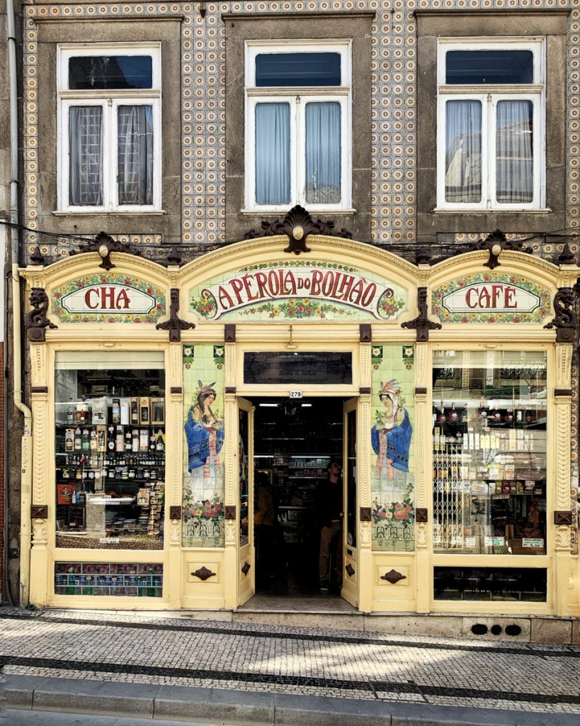 Pretty facade in the town of Porto with a traditional market