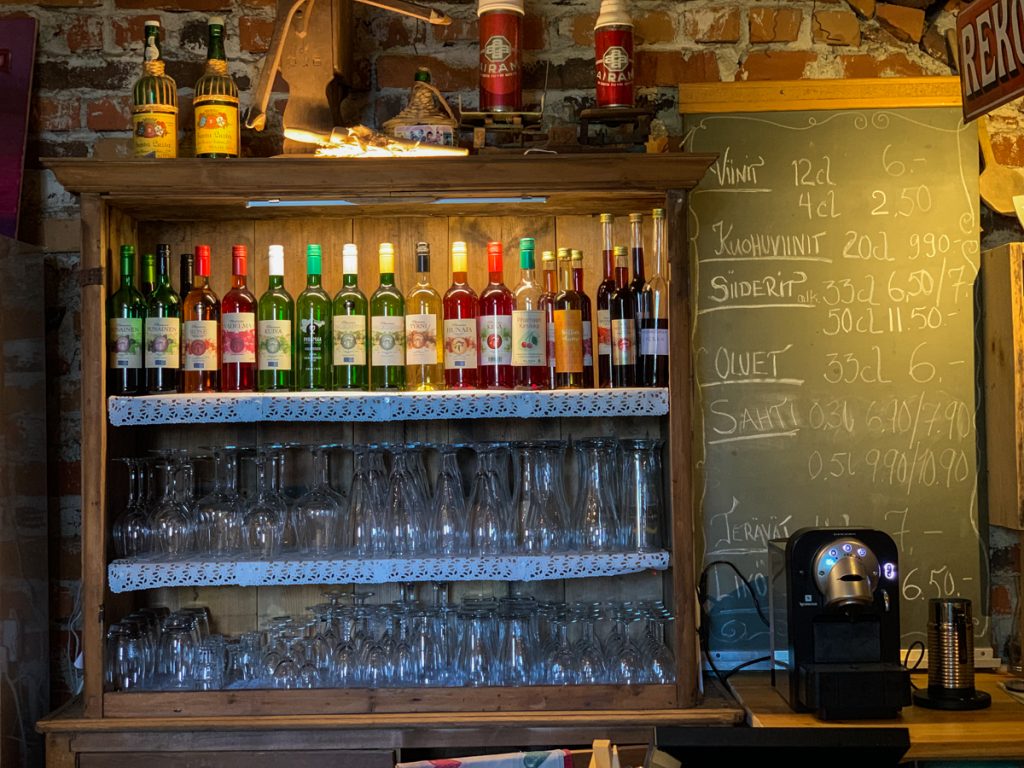 sign at a bar showing their different wines and ciders
