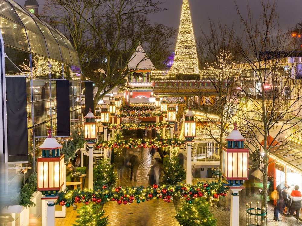 Lots of festive lights and ornaments and Christmas trees all set up for the festive winter season in Copenhagen.