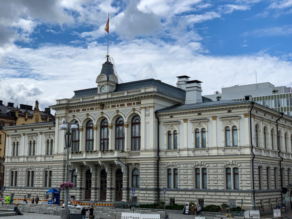 city hall in the center area of town with lots of construction around it