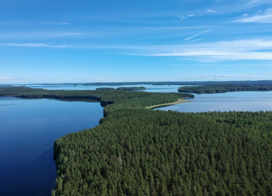 a drone aerial shot over some of the lakes of finnish lakeland