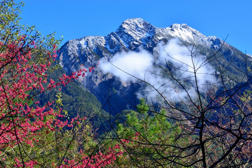 snow capped peak with cloud puff in a cool season of taiwan