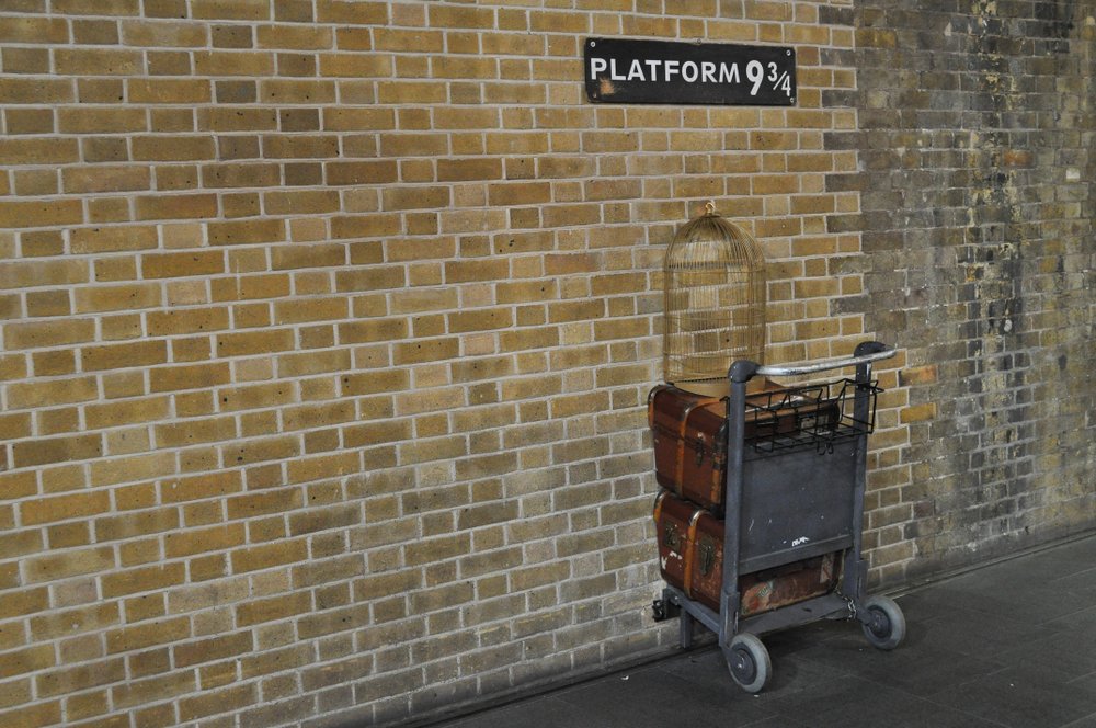 the famous 'half a trolley' statue at platform 9 3/4, a harry potter landmark in london