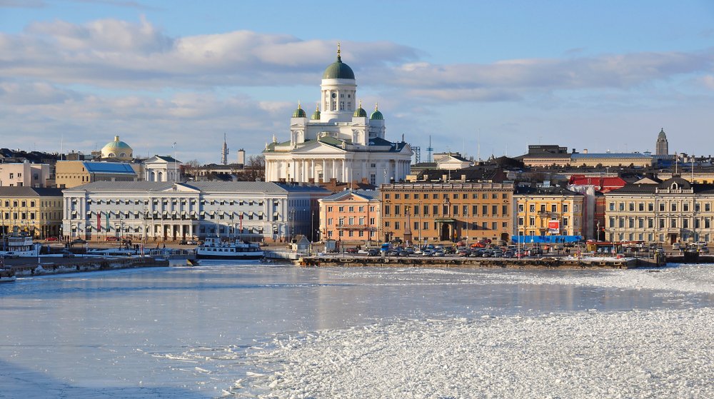 The view of Helsinki Cathedral from the water as you come in from Tallinn on the ferry with an icy harbor area.