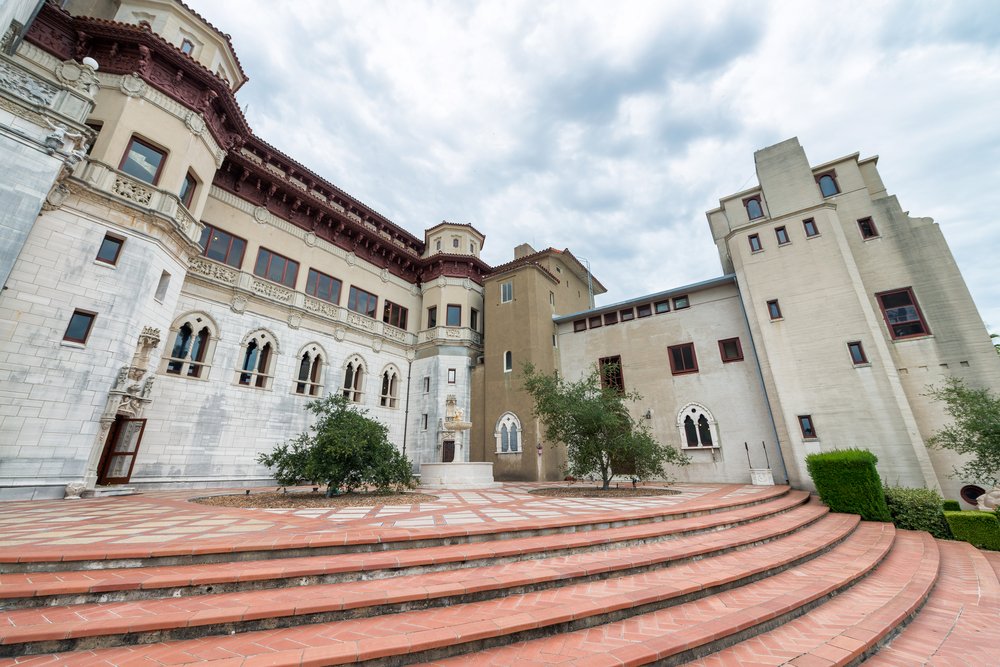 stairs leading up to the fanciful, opulent mansion that is called hearst castle