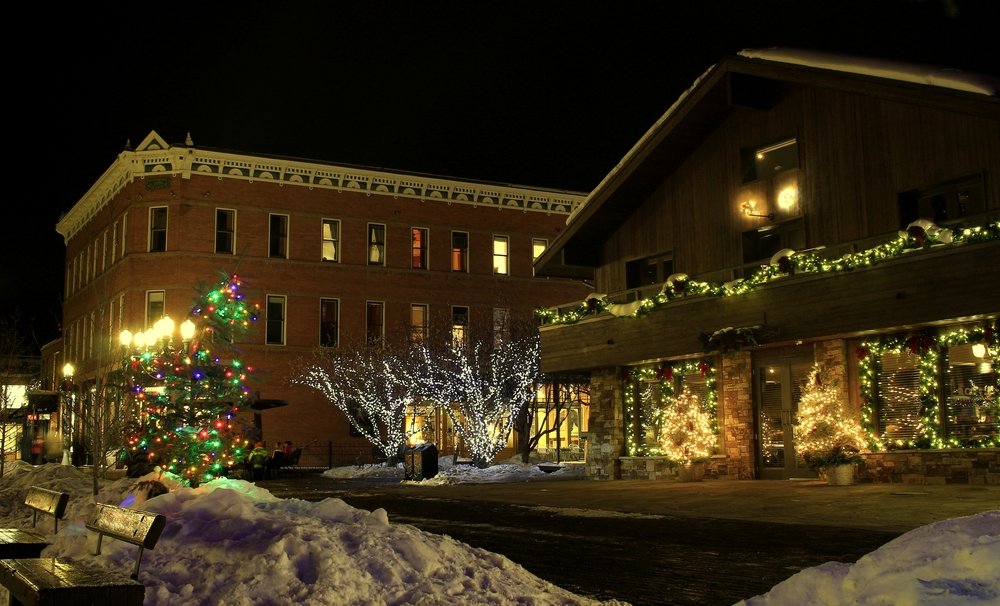 a festive holiday scene in the beautiful town of aspen in colorado