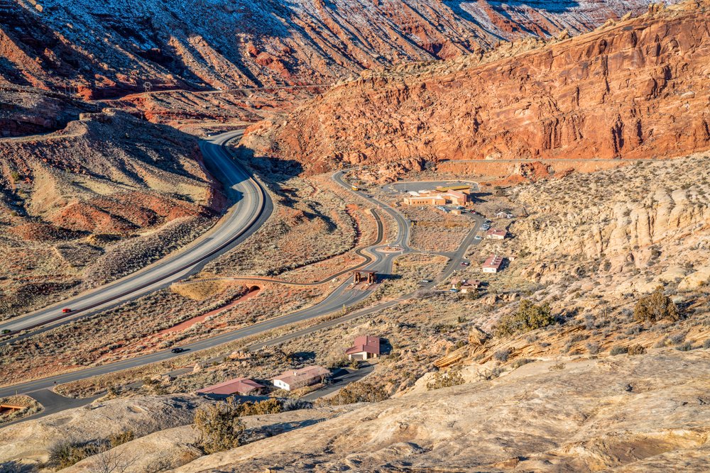 view from the moab fault overlook viewpoint over the red rock landscape of this beautiful utah national park.