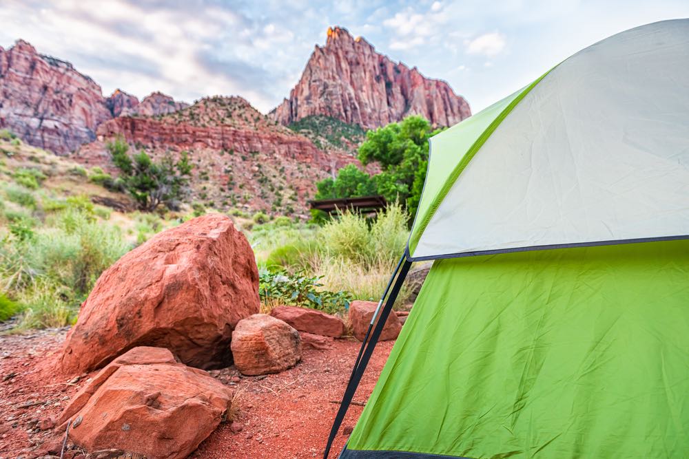 green tent outside of the landscape of zion national park a beautiful red rock landscape in utah