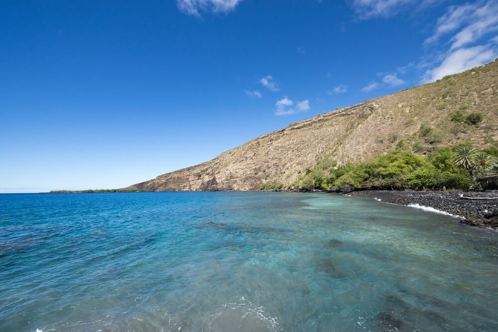brilliant turquoise waters in a bay in hawaii big island